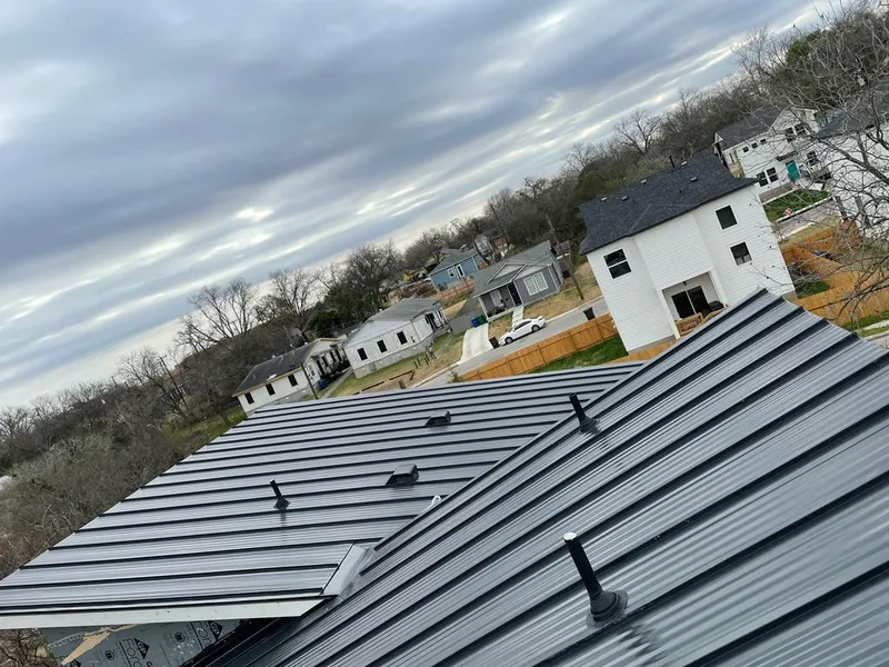 Standing seam metal roof panels with vents for Skylight Repair in Richmond